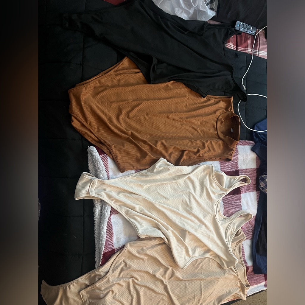4 Brand New Bodysuits